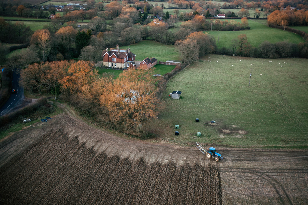 Photo Aerial views of the family farm. Autumn ploughing.