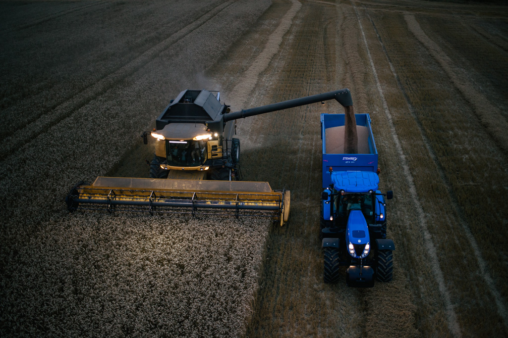 Photo Aerial views of the family farm. Getting the wheat off late at night.
