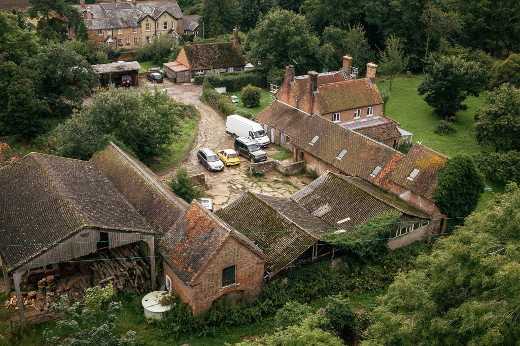 Photo Aerial views of the family farm. Old farm buildings.