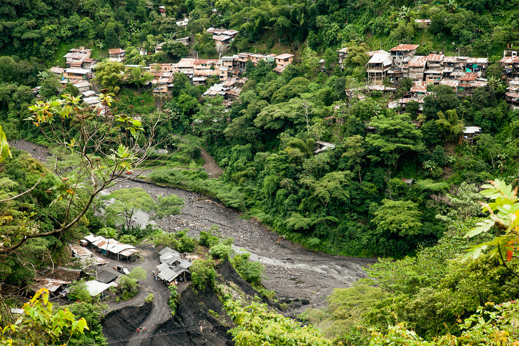 Photo Dwellings perch precariously on the loose slopes above the Rio Minero, which 20 years ago would have been swarming with Guaqueros. 
