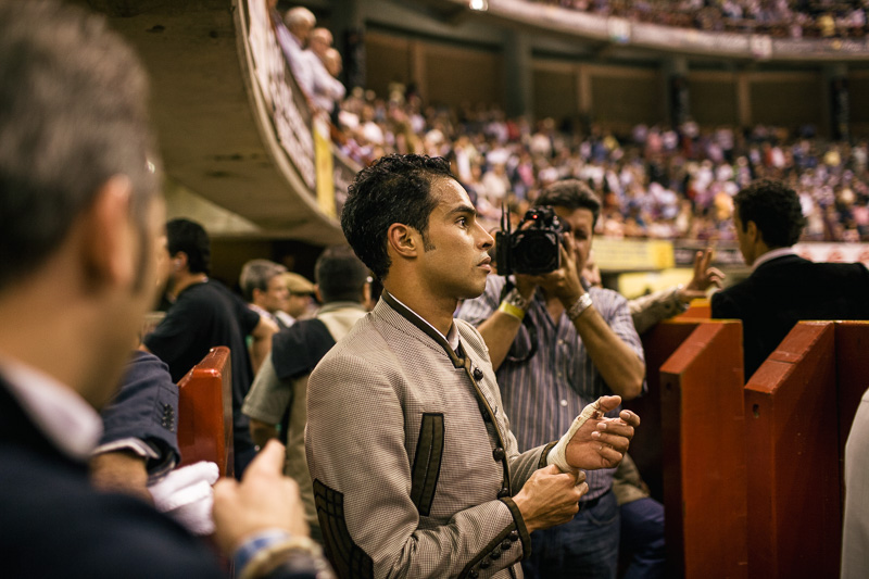 Photo Colombian matador Luis Bolivar takes a break after coming out of the ring during the Festival del Toro in Medellín. Right, a 