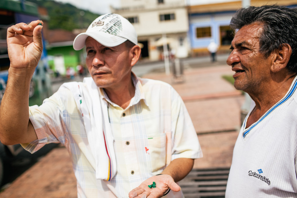 Photo A local emerald trader inspects the quality of stones in the town of Muzo. 