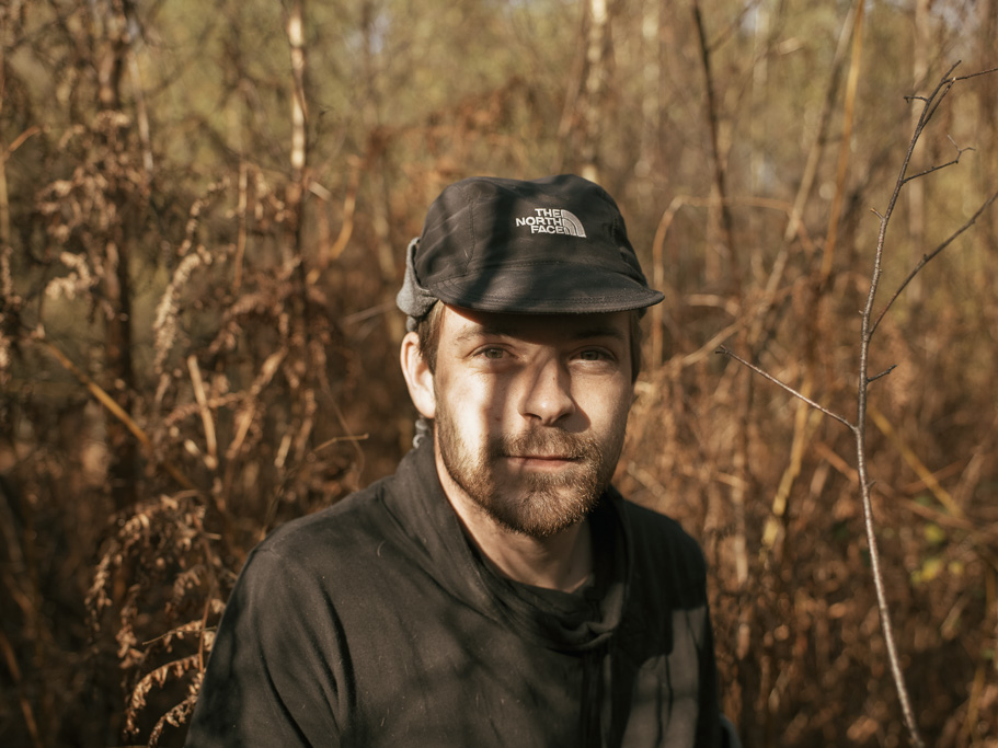 Photo Anatomy of an English country estate. Ryan, who was squatting in a cabin that he built himself in the woods.