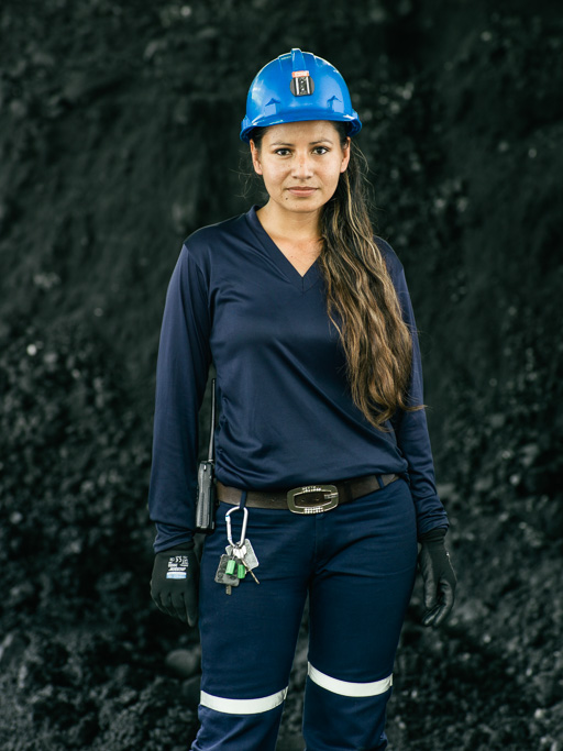 Photo A local girl working as security in the mining compound. 